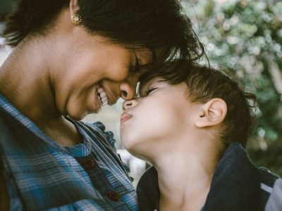 selective focus photography of woman and boy